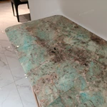 Teal Green Stone Console Table with Parallel Tubular Rose Gold Metal Base